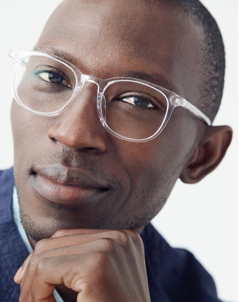 On trend, Armando Cabral sports Warby Parker's Durand low bridge fit glasses in crystal.