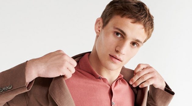 YOOX Provides Sleek Wardrobe Essentials Donning a chic polo and linen blazer, Julian Schneyder wears smart style from YOOX.