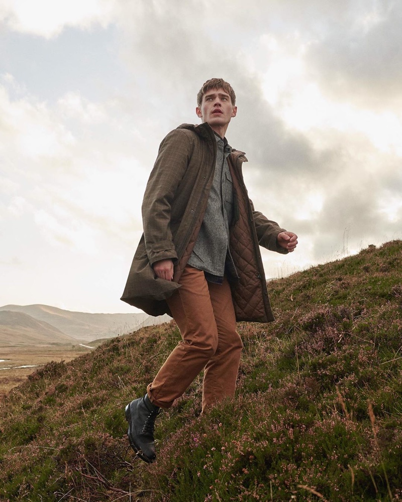 Bo Develius dons a parka and shirt from Barbour's fall-winter 2020 Tartan collection.