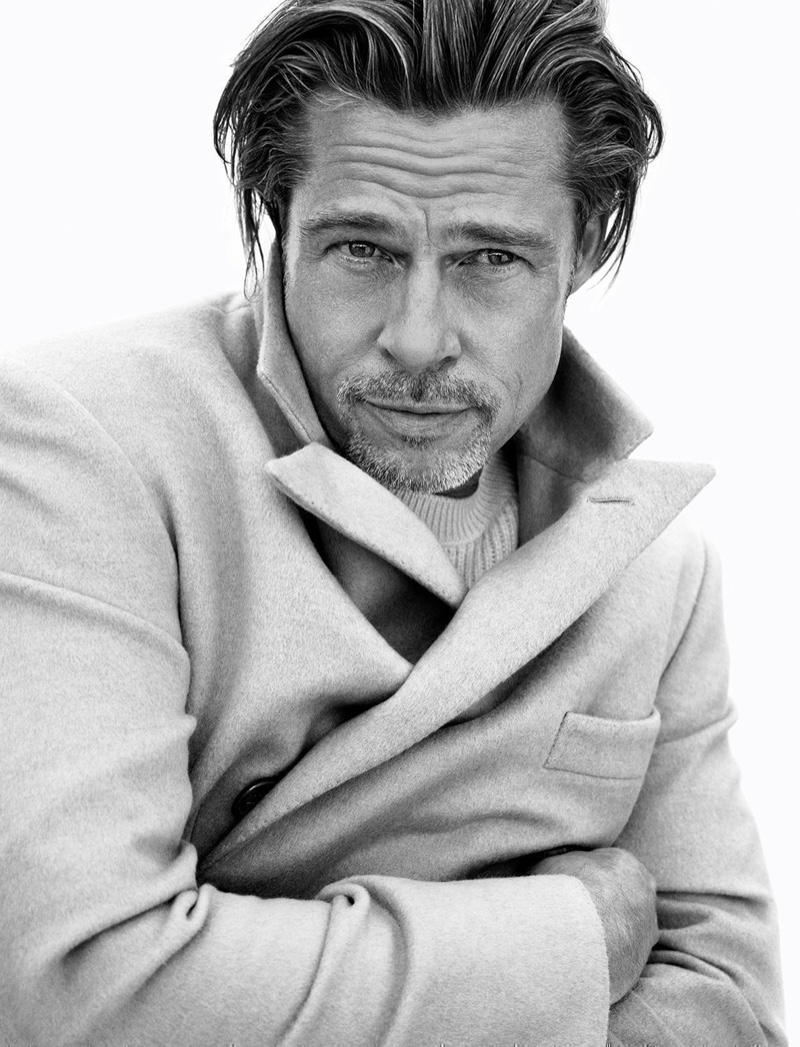 American actor Brad Pitt fronts Brioni's fall-winter 2020 campaign in a white double-breasted coat.