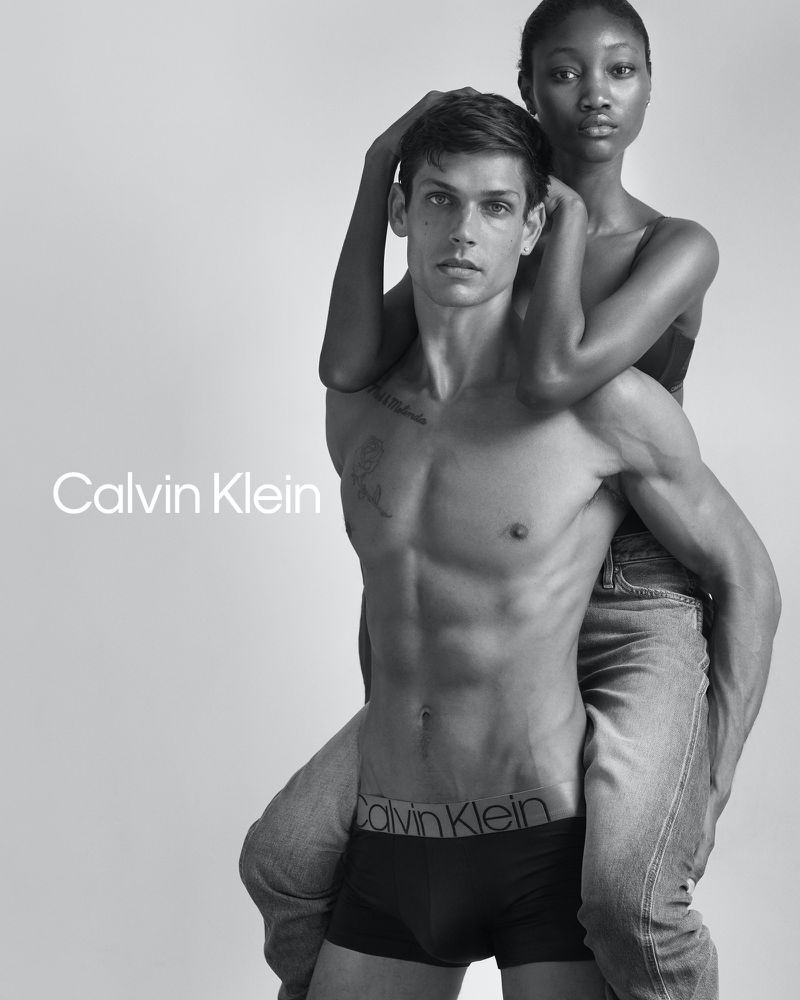 Appearing in a black and white photo, Ethan James Green and Eniola Abioro star in Calvin Klein's fall 2020 #MyCalvins campaign.