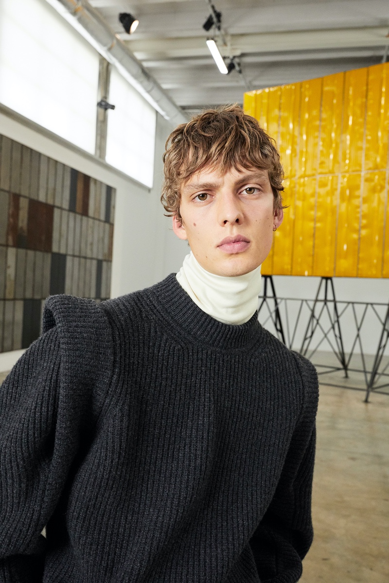 German model Leon Dame sports a turtleneck and ribbed sweater from Isabel Marant for the brand's fall-winter 2020 campaign.