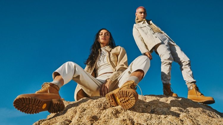Traveling out to the Californian desert, Evan Mock and Kristen Noel Crawley front the Jimmy Choo x Timberland campaign. The pair dons wheat gold nubuck with glitter spray boots.