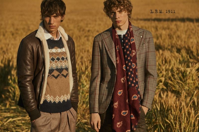 Models Eliot Moles le Bailly and Giulio Donvito sport smart looks from L.B.M. 1911's fall-winter 2020 collection.