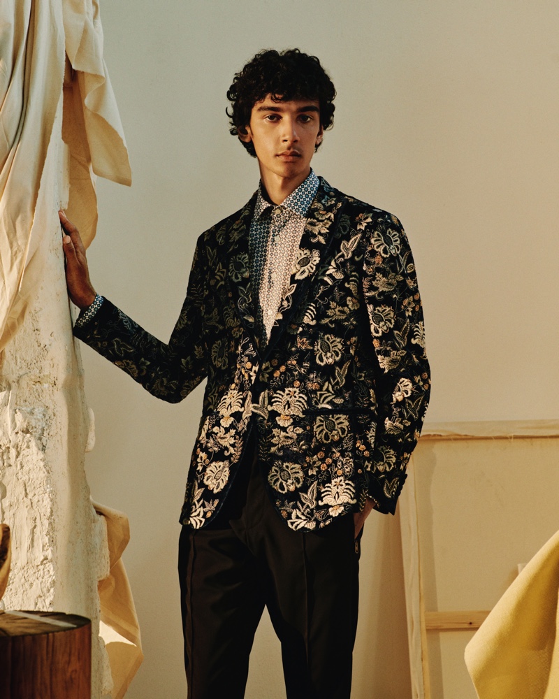 An elegant vision, Callum Stoddart models an Etro embellished velvet tuxedo jacket with a printed cotton shirt and tapered wool trousers from Mr Porter's Italian Masters collection.