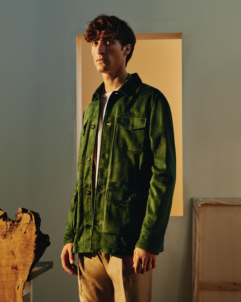 Front and center, Tim Dibble sports a green suede field jacket from Mr Porter's Italian Masters collection.