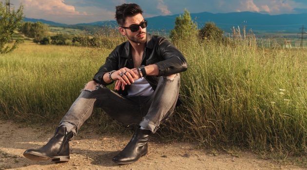 5 Tips for Men to Wear Rings in Style Male Model Leather Jacket Jeans Boots Sunglasses Rings