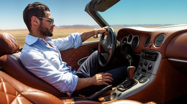 7 Tips to Show Off Your Interest in Cars Man Driving Luxury Car