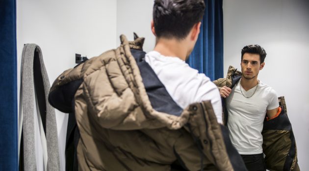 How to Change Your Style in 4 Steps Man Trying on Clothes