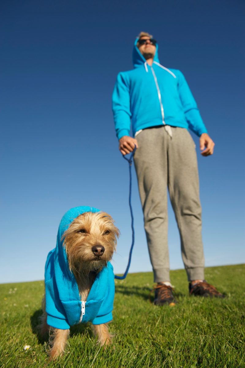 Man Walking Dog Wearing Hoodie