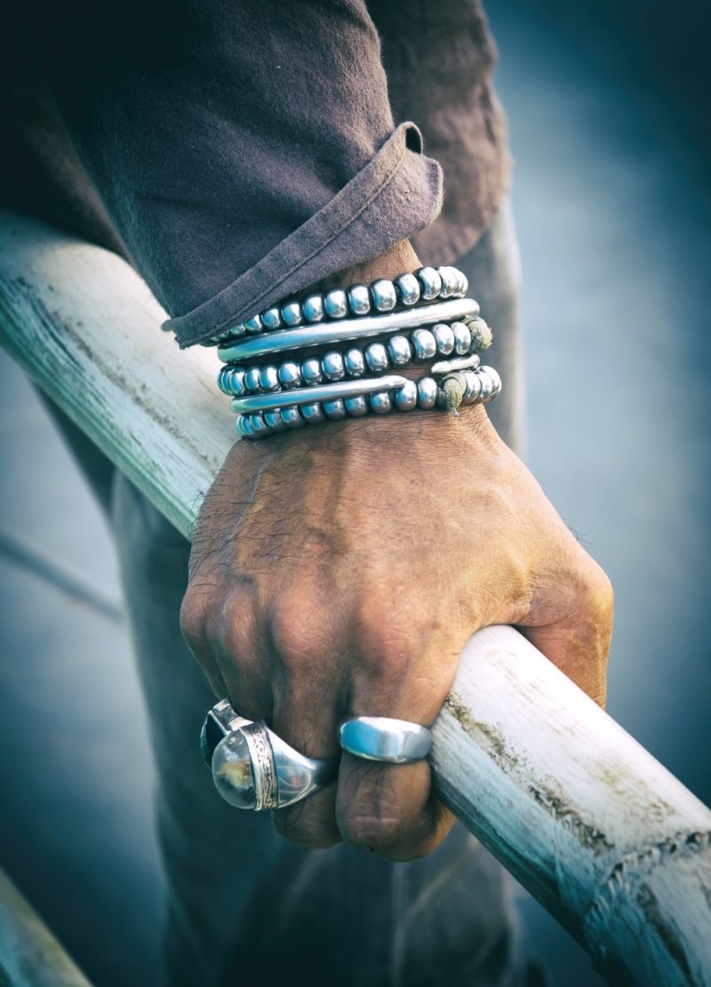 Man Wearing Silver Jewelry