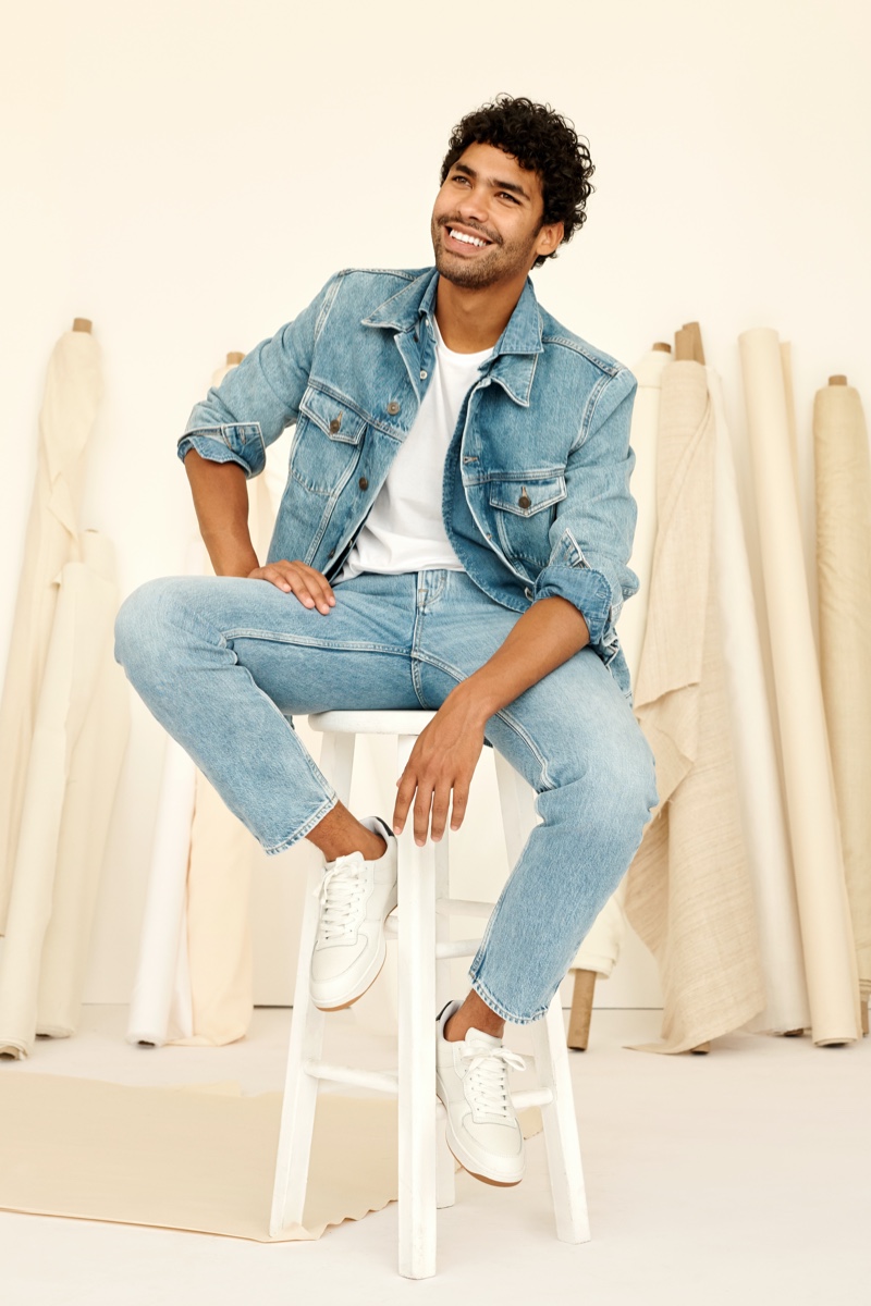 All smiles, Alex J. Ordóñez showcases light wash denim from Mango.