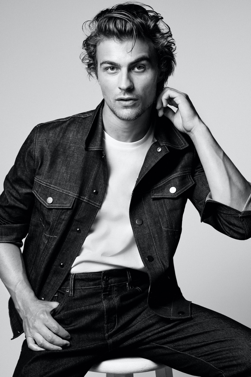 Brett Robinson dons a dark denim look from Mango.