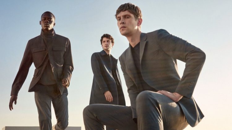 Models Alpha Dia, Matthew Bell, and Mathias Lauridsen dons tailored menswear from Mango's Improved collection.