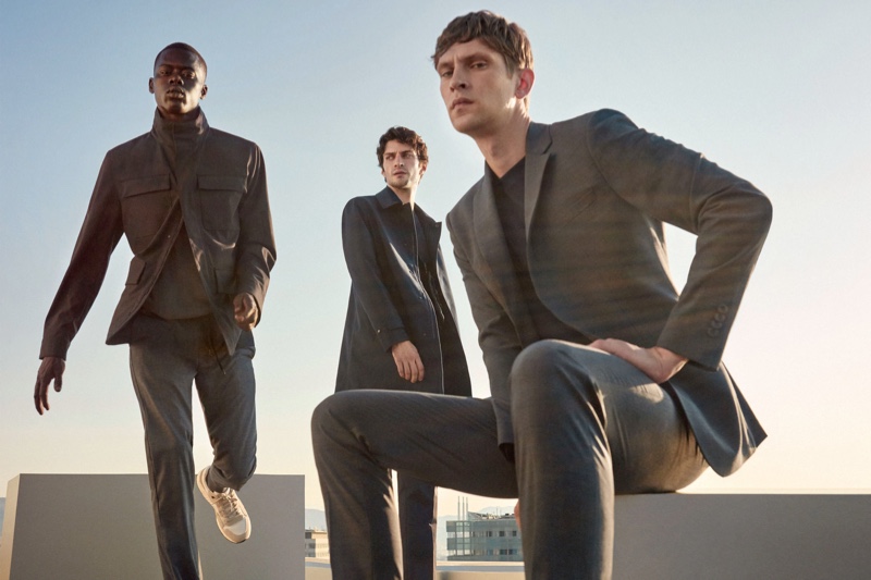 Models Alpha Dia, Matthew Bell, and Mathias Lauridsen dons tailored menswear from Mango's Improved collection.