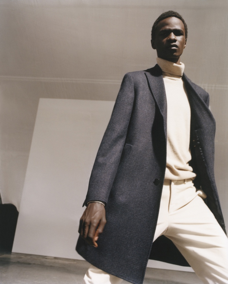 Showcasing monochromatic style for the season, Malick Bodian wears a look from Massimo Dutti's fall-winter 2020 men's collection.