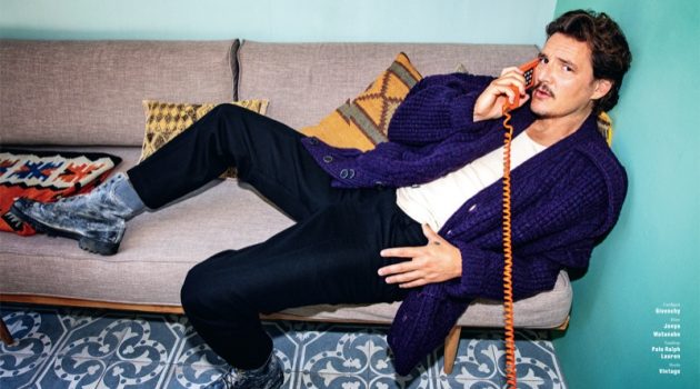 Pedro Pascal is a Fashion Plate for GQ Germany Cover Story Taking a phone call, Pedro Pascal dons a cardigan sweater by Givenchy. Posing for GQ Germany, Pascal's look is complete with Junya Watanabe pants, a POLO Ralph Lauren tank, and vintage boots.