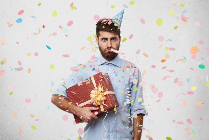 Sad Man with Gift Sad Man with Gift