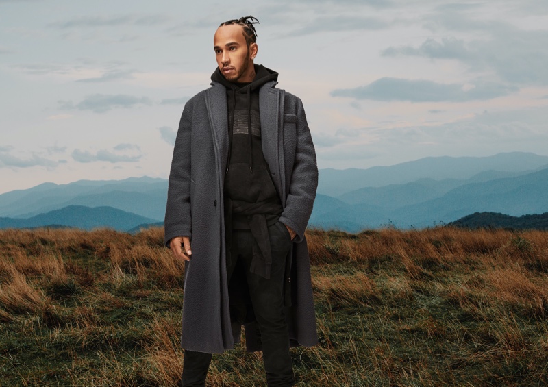 Front and center, Lewis Hamilton embraces monochromatic style in a black and gray look from his fall-winter 2020 TommyxLewis collection.