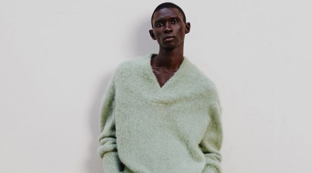 Fernando, Jonas & Sang Don Light Fall Layers from COS Mixing muted tones, Fernando Cabral stands out in a v-neck wool-mix sweater and corduroy trousers with chunky leather boots by COS.