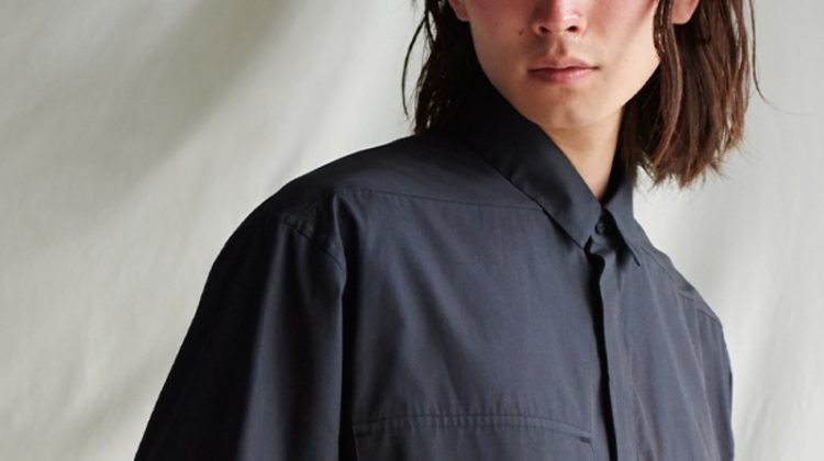 Olie Arnold styles an oversized shirt with a braided leather belt from the Fear of God for Ermenegildo Zegna collection.