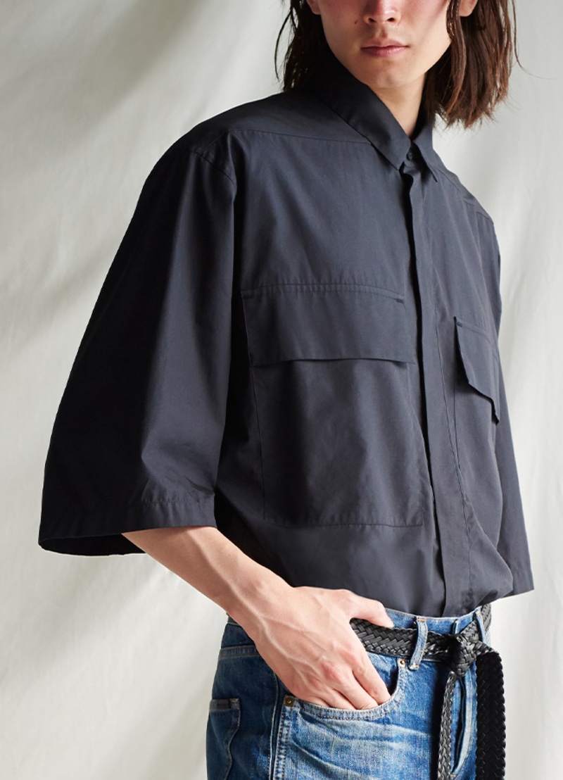Olie Arnold styles an oversized shirt with a braided leather belt from the Fear of God for Ermenegildo Zegna collection.