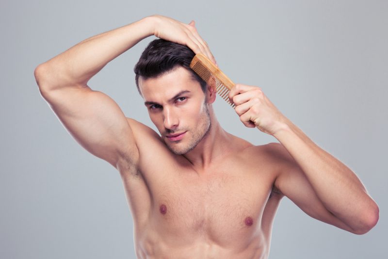 Man Combing Hair