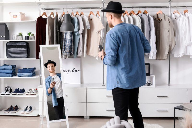 Man Trying on Clothes
