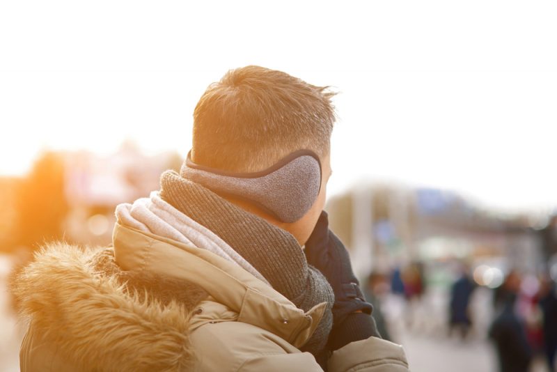 Man Wearing Earmuffs