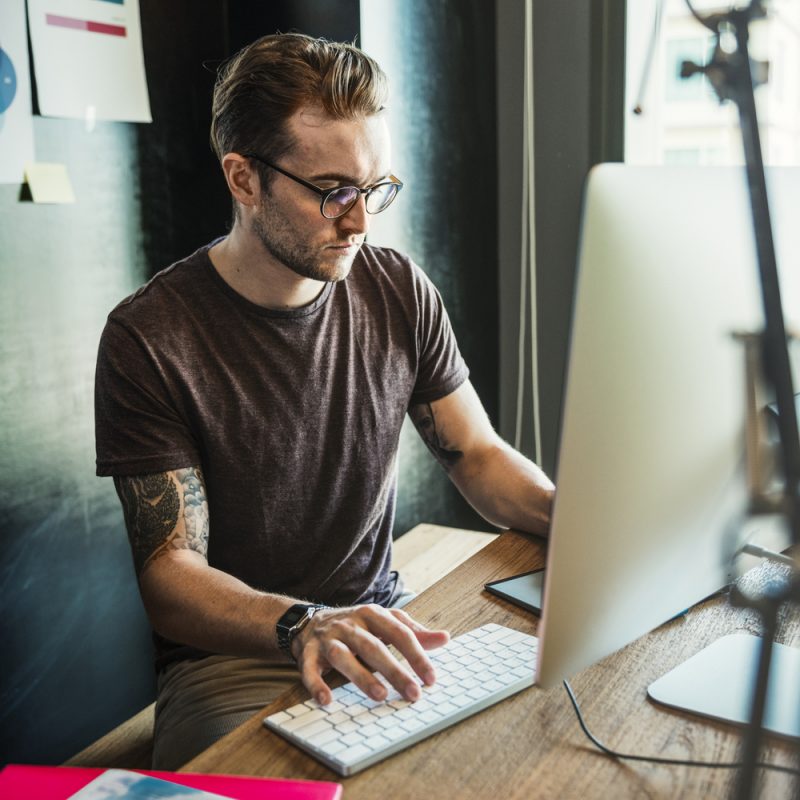 Man on Computer Editing
