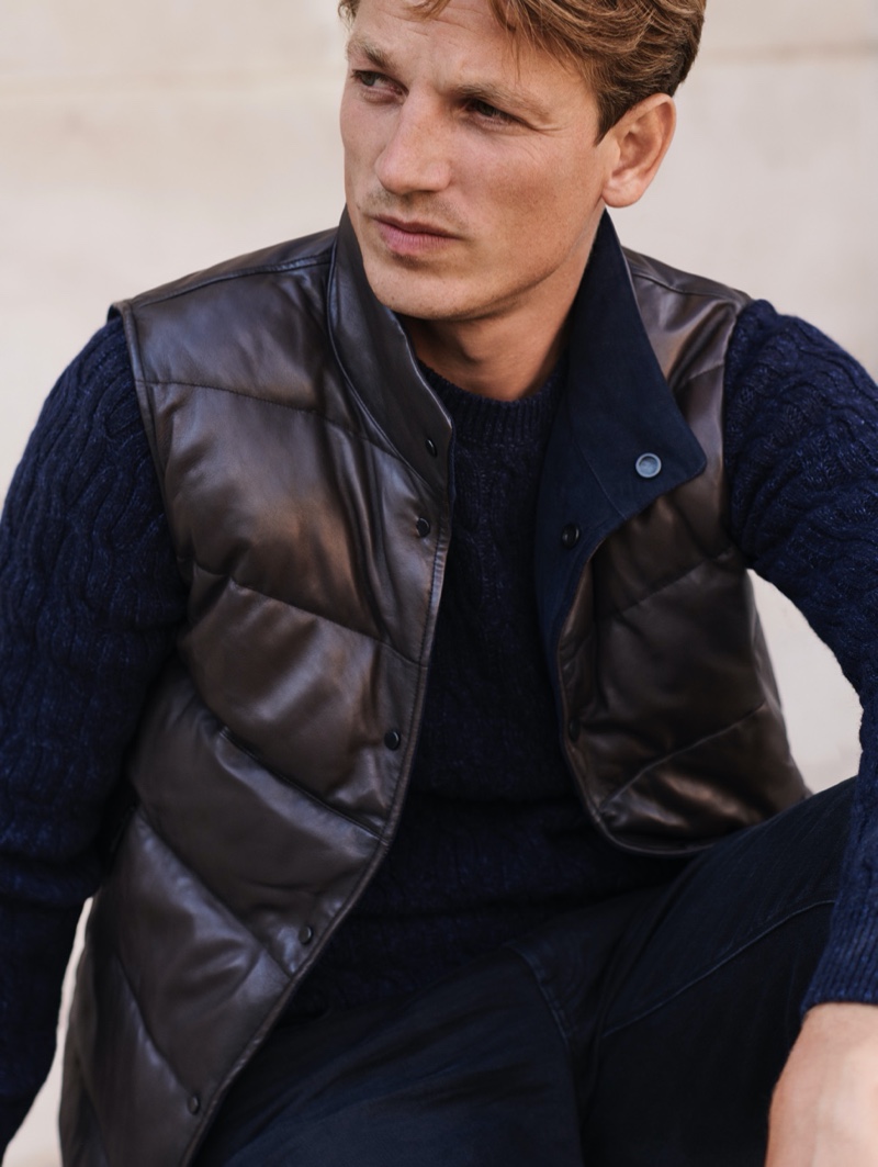 Reuniting with Massimo Dutti for a fall editorial, Hugo Sauzay dons a quilted vest with a cable-knit sweater.