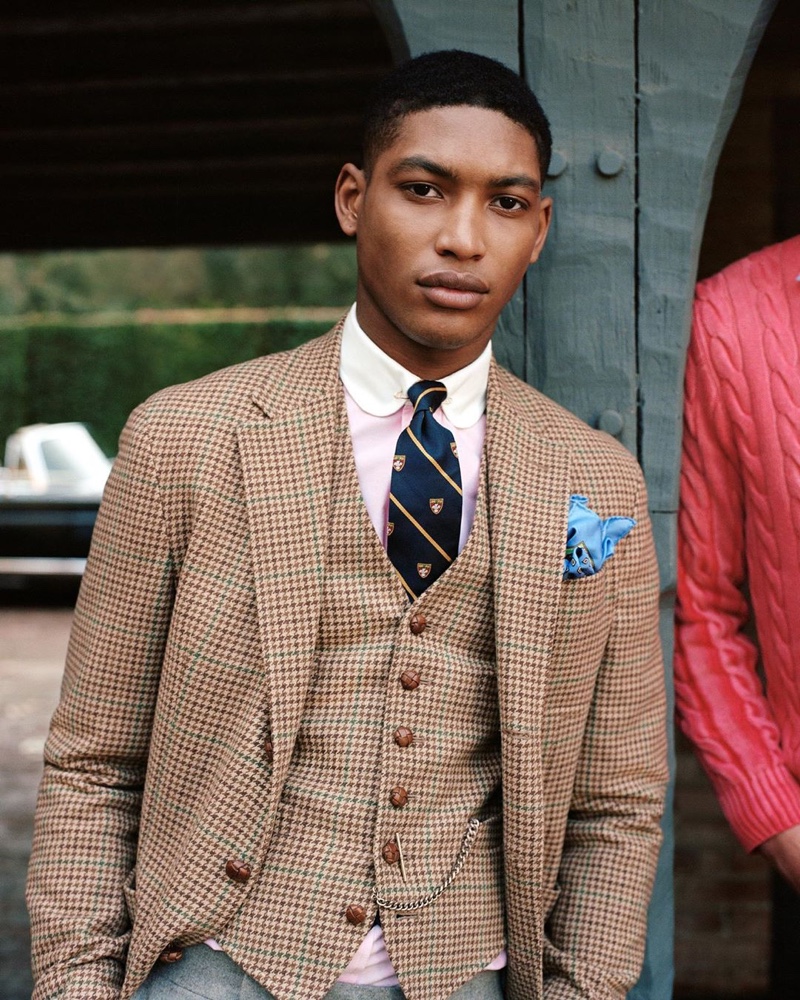 Timothy Lewis sports a matching waistcoat and blazer from POLO Ralph Lauren's fall 2020 collection.