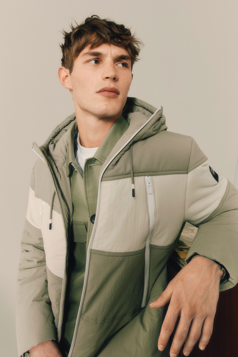 British model Kit Butler rocks a hooded jacket and more from River Island's Partywear collection.
