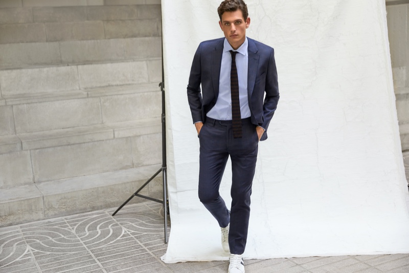 Model Pau Ramis dons a sharply tailored suit from Roberto Verino's fall-winter 2020 menswear collection.