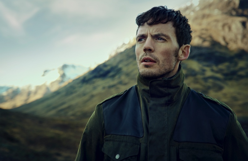 Sam Claflin dons a Barbour Gold Standard Supa-Corbridge waxed jacket for the brand's fall-winter 2020 campaign.