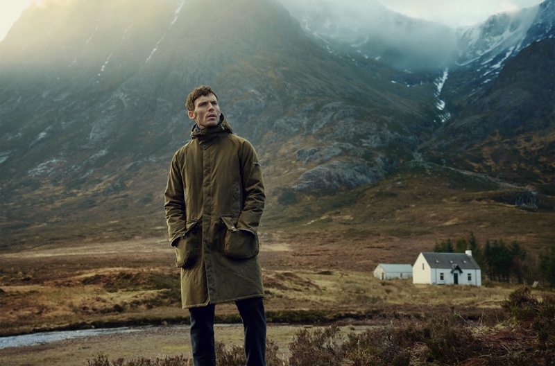 Keeping warm in Barbour Gold Standard's Supa Hunting wax jacket, Sam Claflin fronts the fall-winter 2020 campaign.