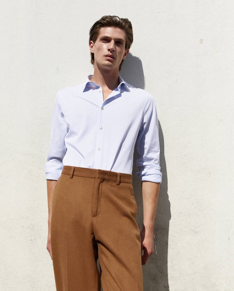 Italian model Edoardo Sebastianelli showcases smart shirting from Scotch & Soda's fall-winter 2020 collection.