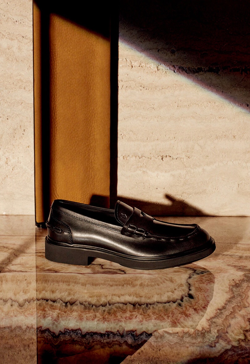 Tod's highlights its black leather Clint loafers as part of its fall-winter 2020 campaign.