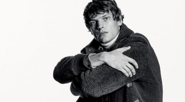 Valentin Stars in Tod's Fall '20 Campaign Valentin Caron sits for a portrait as the star of Tod's fall-winter 2020 men's campaign. He dons a pair of the brand's black leather ankle boots.