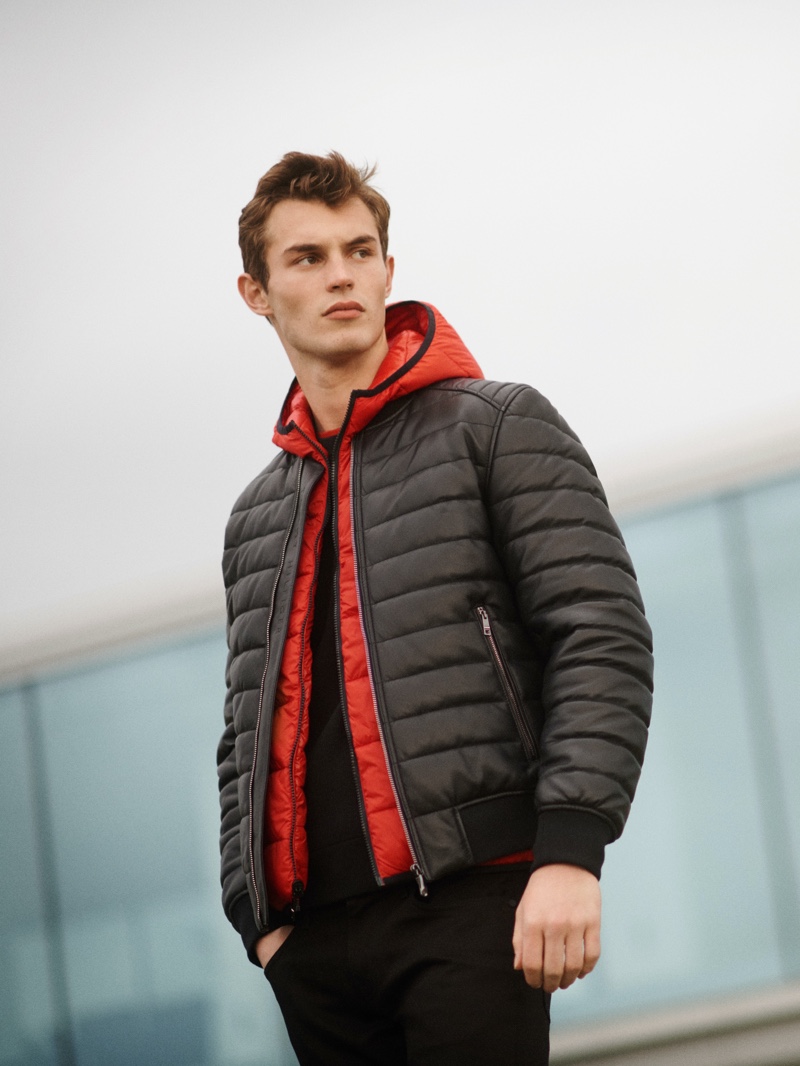 British model Kit Butler sports a quilted jacket from the Tommy x Mercedes-Benz fall-winter 2020 collection.