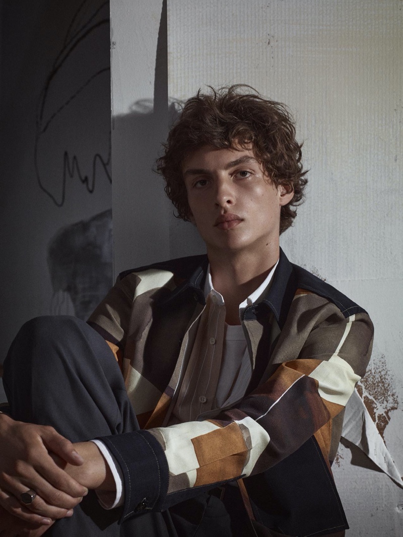 Lucas El Bali is an elegant vision as he layers in an abstract print shirt and striped top for Zara's fall-winter 2020 men's campaign.