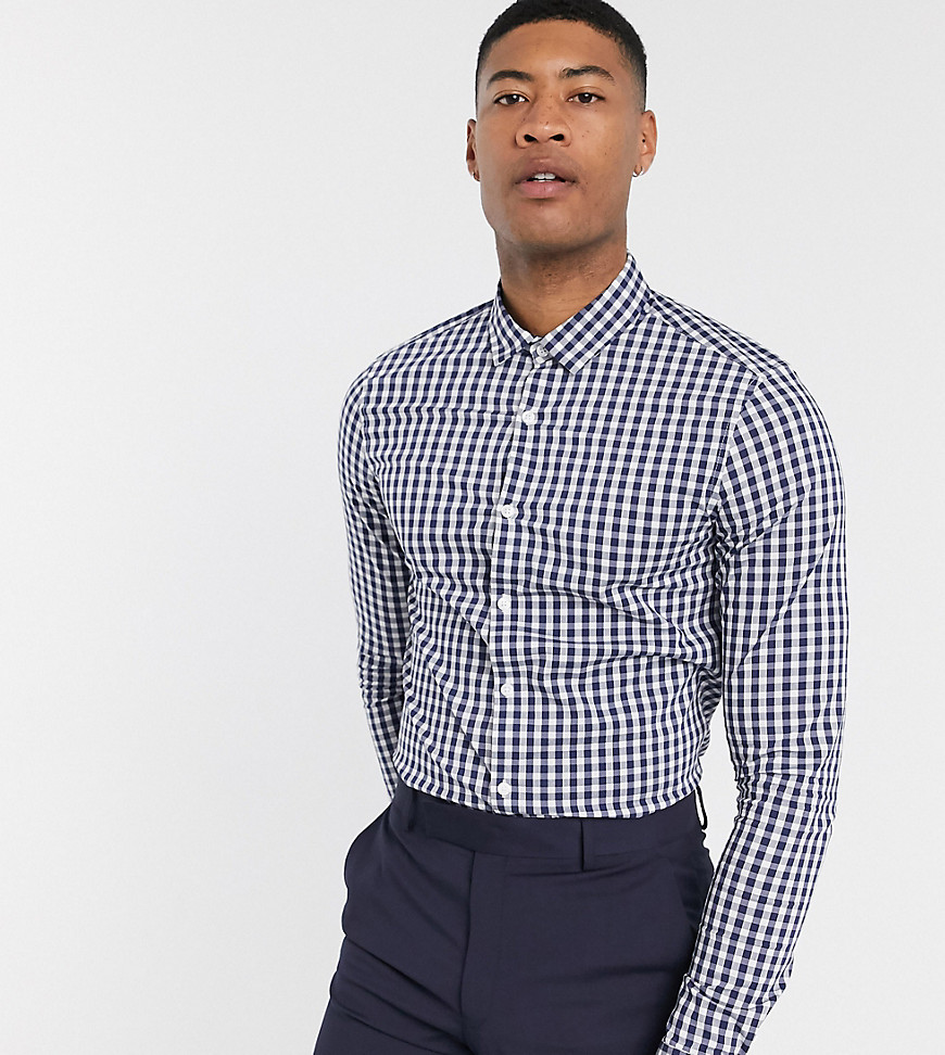 blue check shirt with black pants
