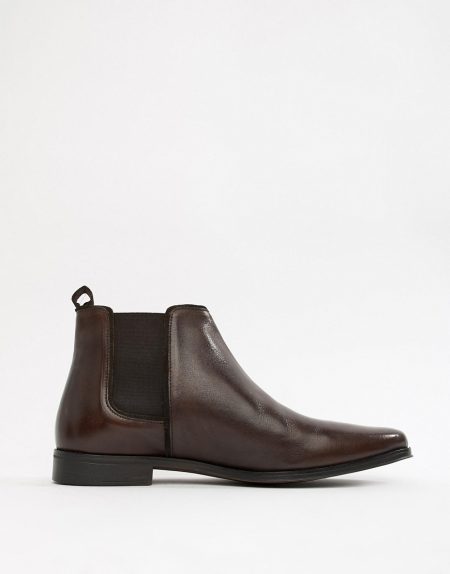 black chelsea boots brown sole