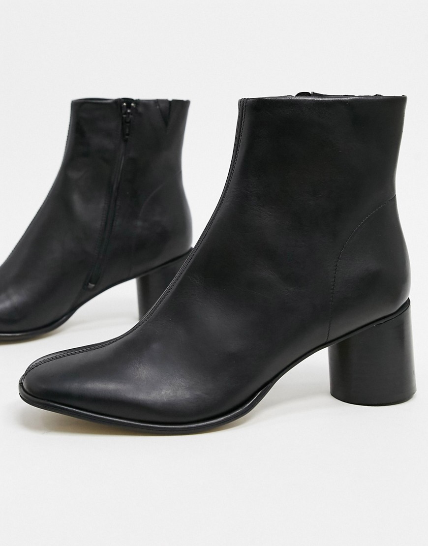 ASOS DESIGN heeled chelsea boots with rounded toe in black leather with ...