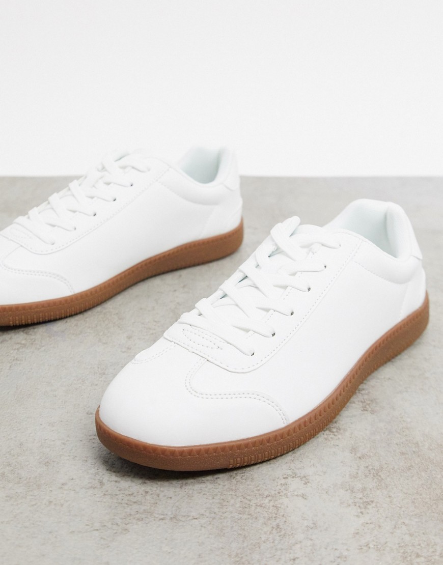 white sneaker with gum sole