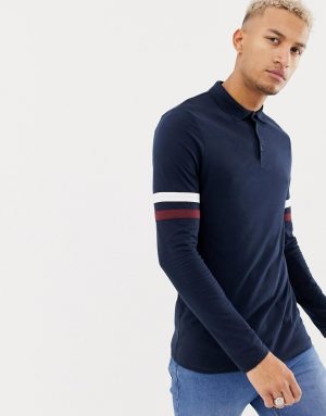 ASOS DESIGN long sleeve polo shirt with contrast sleeve stripe in navy ASOS DESIGN long sleeve polo shirt with contrast sleeve stripe in navy
