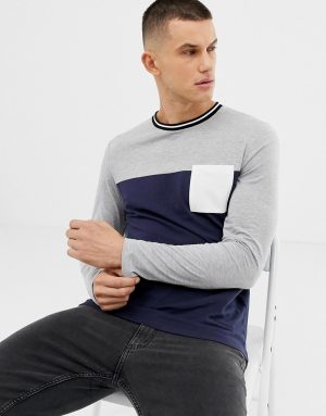 ASOS DESIGN long sleeve t-shirt with contrast yoke and pocket in navy ASOS DESIGN long sleeve t-shirt with contrast yoke and pocket in navy