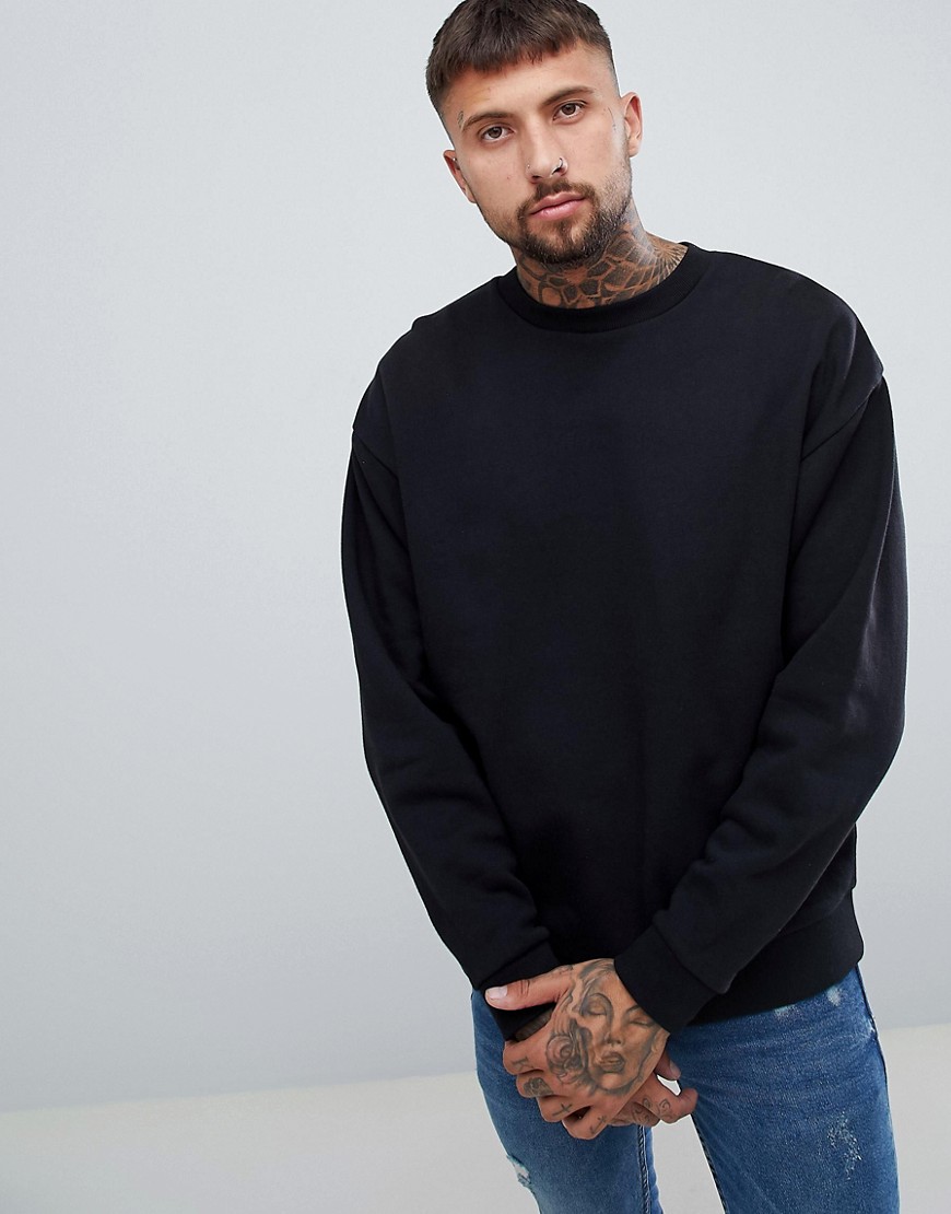ASOS DESIGN oversized sweatshirt in black | The Fashionisto