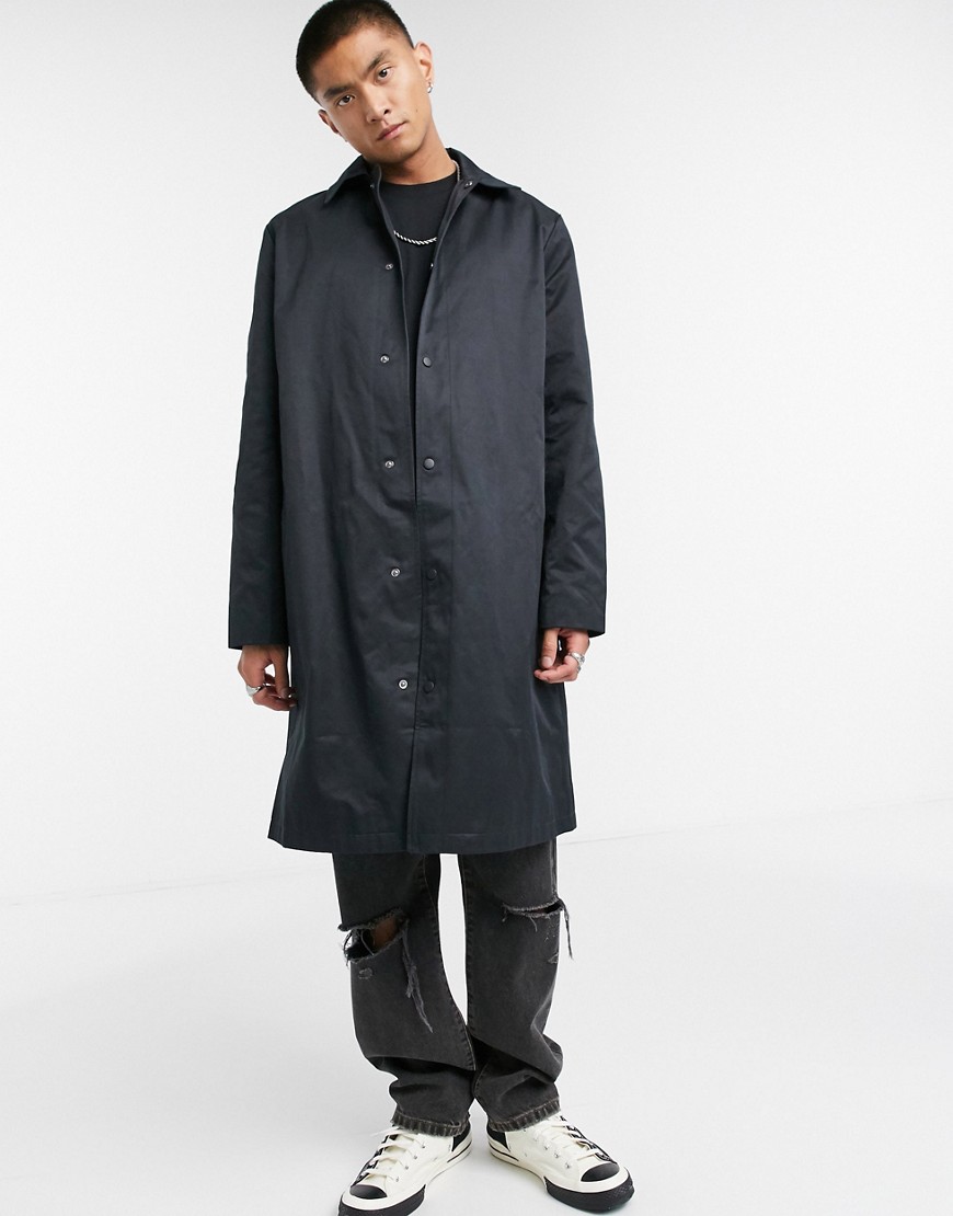 ASOS DESIGN oversized trench coat in black with snaps | The Fashionisto