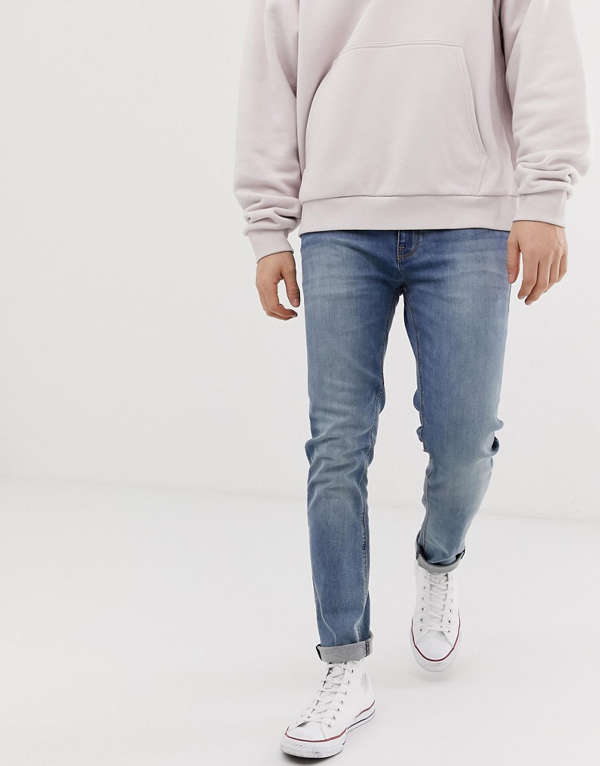 mid wash denim jeans